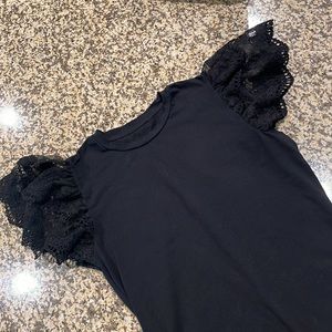 Woman’s black lace short sleeve t-shirt. No tags it’s a small. Same as red top.
